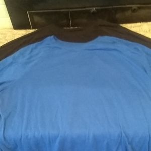 Two mens long sleeve shirts